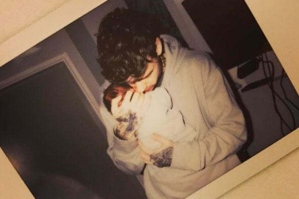 Newborn: Cheryl announced the news with a picture of her son being held by Liam