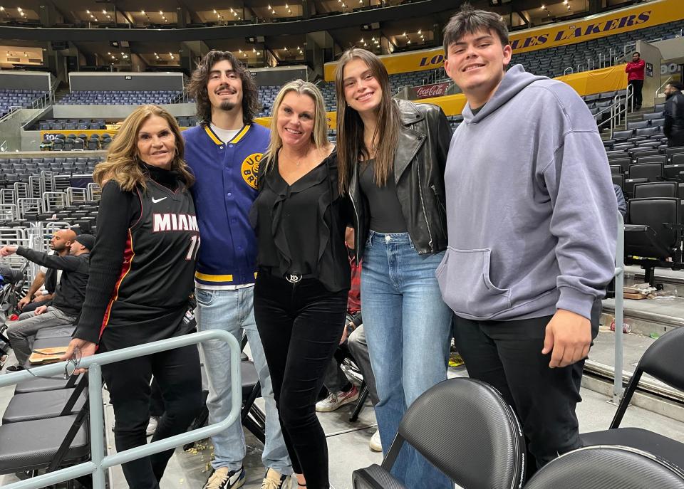 Jaime Jaquez Jr. poses with family after the Heat's game against the Lakers in Los Angeles on Wednesday. Pictured are grandmother Doreen Hitterdal (left to right), Jaime, mother Angela, younger sister Gabriela and younger brother Marcos.