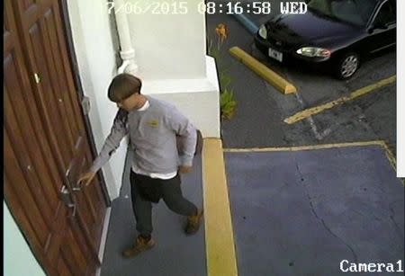 A suspect which police are searching for in connection with the shooting of several people at a church in Charleston, South Carolina is seen in a still image from CCTV footage released by the Charleston Police Department June 18, 2015. REUTERS/Charleston Police Department/Handout via Reuters