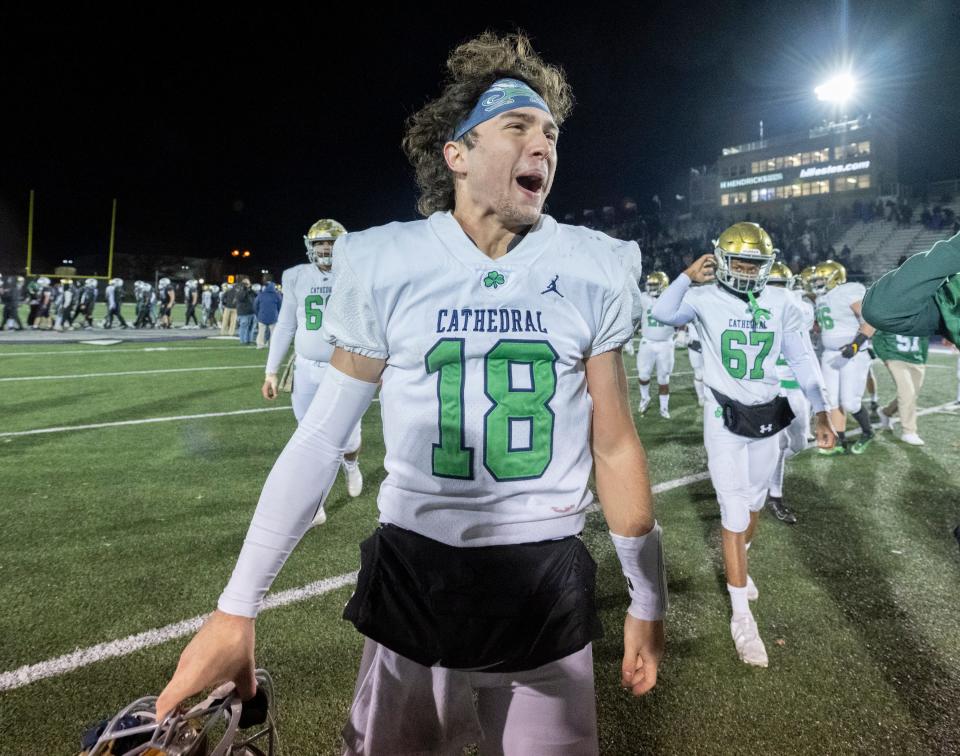 Indianapolis Cathedral High School junior Danny O'Neil (18) reacts after the team defeated Brownsburg High School in an IHSAA Class 6A Regional football game, Friday, Nov. 11, 2022, at Brownsburg High School. Indianapolis Cathedral High School won, 14-7.