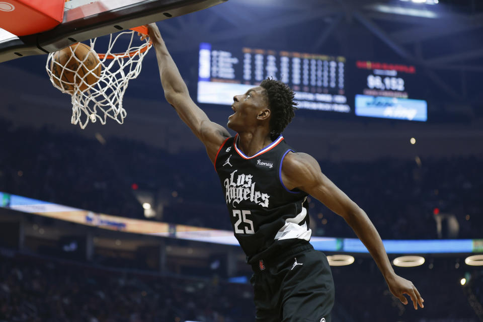 Los Angeles Clippers forward Moussa Diabate dunks against the Cleveland Cavaliers during the first half of an NBA basketball game, Sunday, Jan. 29, 2023, in Cleveland. (AP Photo/Ron Schwane)