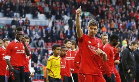 Football - Liverpool v Crystal Palace - Barclays Premier League - Anfield - 16/5/15 Liverpool's Steven Gerrard acknowledges the crowd as he walks on the pitch after his final game at Anfield Action Images via Reuters / Carl Recine