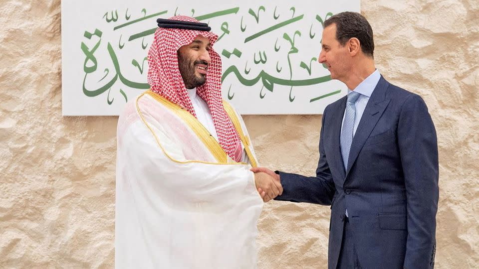 Saudi Arabia's Crown Prince Mohammed bin Salman shakes hands with Syria's President Bashar al-Assad ahead of the Arab League Summit in Jeddah, Saudi Arabia, May 19, 2023. - Bandar Algaloud/Saudi Royal Court via Reuters