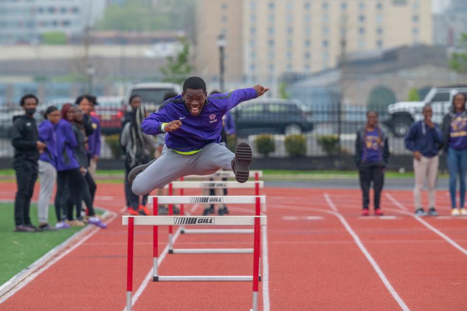 A Camden High School athlete clears hurdles at the new Camden Athletic Fields, which were officially opened on Monday.