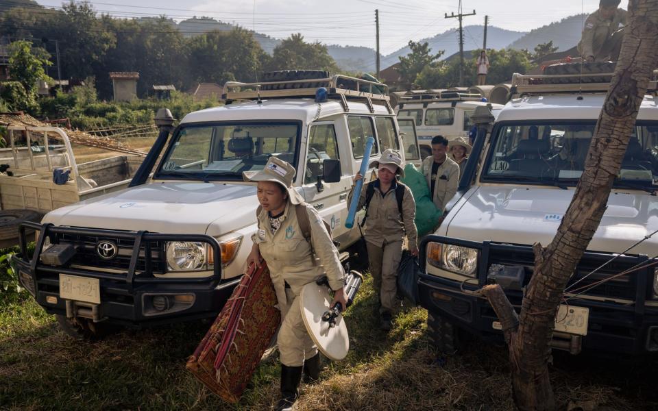 The demining team return to the village hall being used as a base for local operations in Sop Hun