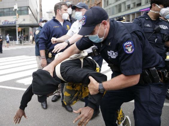 NYPD officers arrested protester following clashes in Union Square (Alamy Live News)