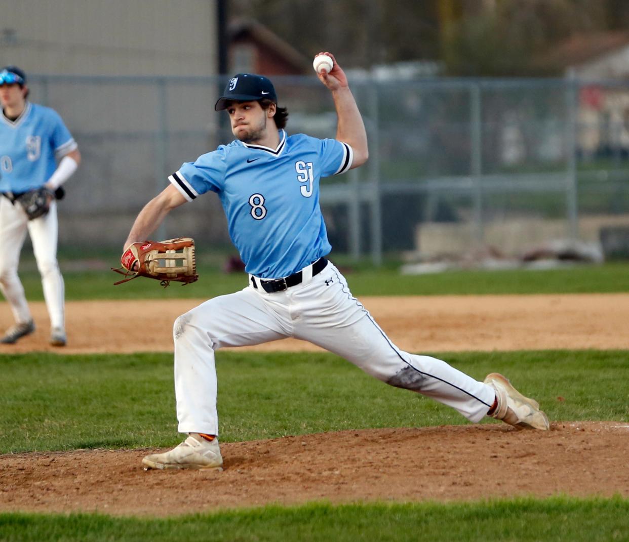 Saint Joseph senior Thomas Eck throws a pitch during a baseball game against Mishawaka Friday, April 12, 2024, at Ward Baker Park in Mishawaka.