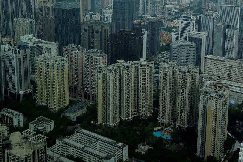 FILE PHOTO: Residential and commercial buildings are located in downtown Guangzhou