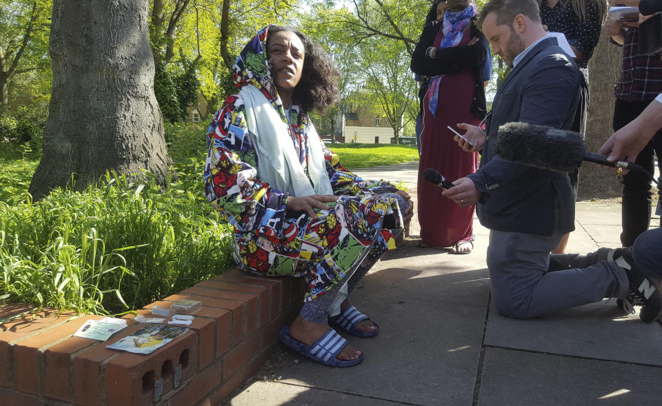 Pretana Morgan speaks to reporters after her 17-year-old son Rhyhiem Ainsworth Barton was shot in Southwark, south London, on Saturday. (Catherine Wylie /PA via AP)