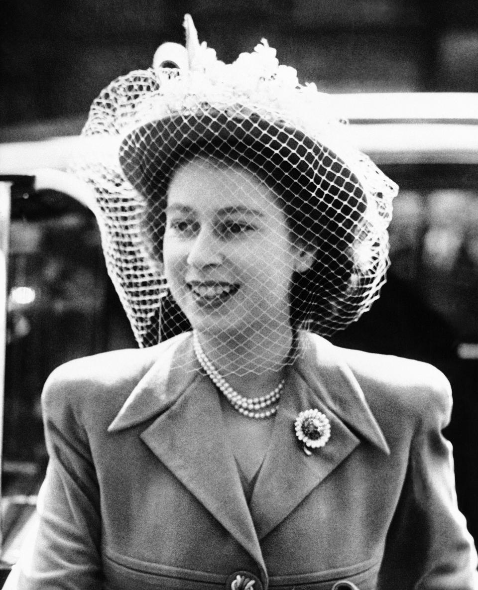 Queen Elizabeth in 1948 wearing a hat with a veil