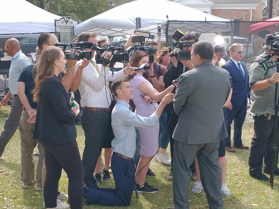 Dr. Kenneth Kinsey, a memorable 'star witness' in the murder trial of Alex Murdaugh, is surrounded by journalists asking for comments after the recent trial.