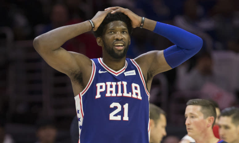 Joel Embiid reacting to a call during a game.