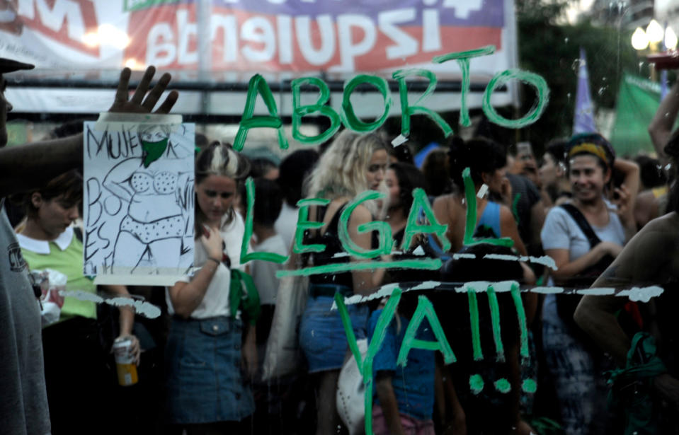 Protesters make a stand after Argentina’s senate narrowly rejected a bill to legalise abortion, which would have allowed women and girls to seek an abortion during the first 14 weeks of pregnancy. Source: Juan Mabromata/AFP/Getty Images