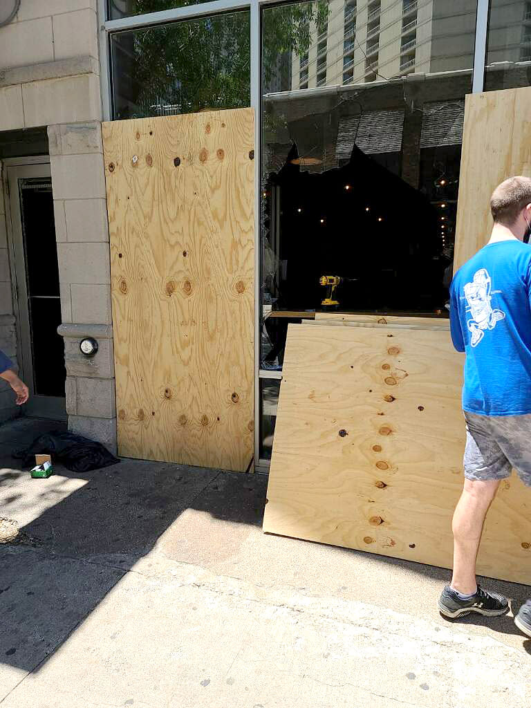Boards are put up after the Downtown Chicago branch of Seoul Taco was vandalized on May 30, 2020. (Seoul Taco)