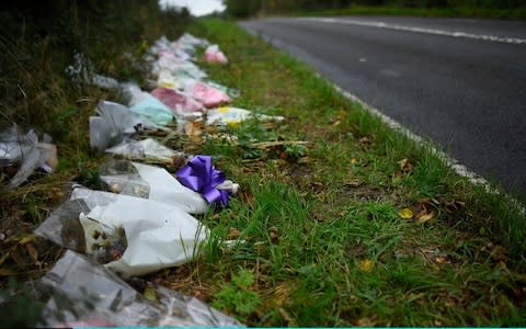 Flowers left in remembrance of Harry Dunn on the B4031 near RAF Croughton - Credit: Peter Summers&nbsp;/Getty Images