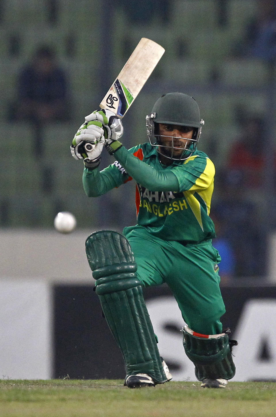 Bangladesh's Mominul Haque plays a shot during their second one-day international (ODI) cricket match against Sri Lanka in Dhaka, Bangladesh, Thursday, Feb. 20, 2014. (AP Photo/A.M. Ahad)