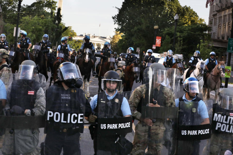 Police block 16th Street in Washington, DC on June 1, 2020. (Photo by Evelyn Hockstein for The Washington Post via Getty Images) | Evelyn Hockstein–The Washington Post/Getty Images