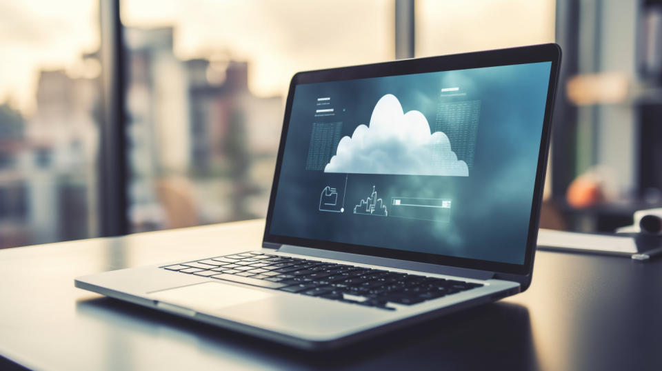 A close up view of a laptop computer, the cloud computing platform displayed on the screen.