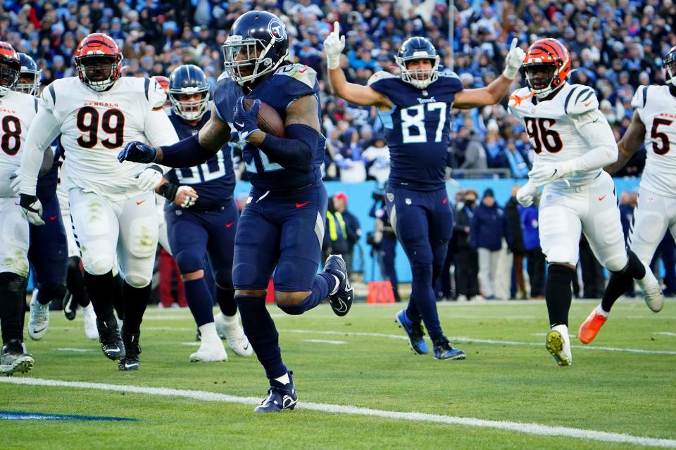 Tennessee Titans running back Derrick Henry (22) scores a touchdown in the second quarter during an NFL divisional playoff football game against the Cincinnati Bengals, Saturday, Jan. 22, 2022, at Nissan Stadium in Nashville.