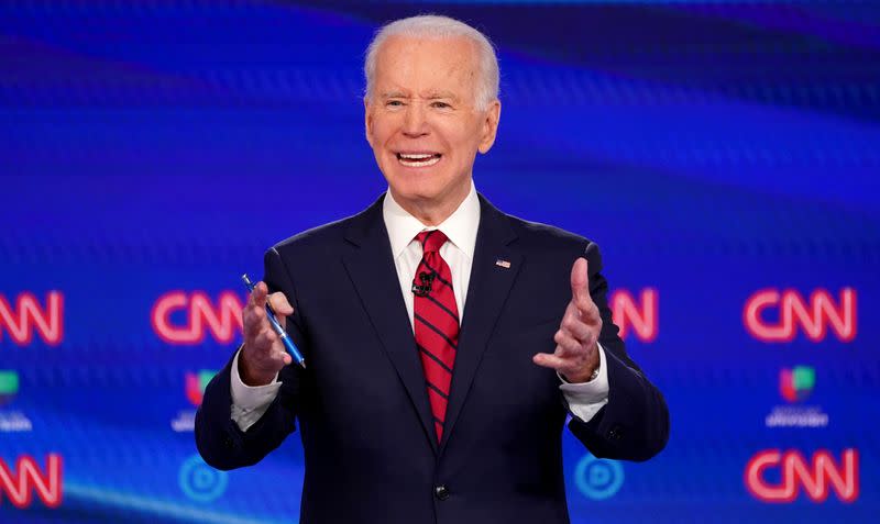 FILE PHOTO: Democratic U.S. presidential candidate and former Vice President Joe Biden speaks at the 11th Democratic candidates debate of the 2020 U.S. presidential campaign in Washington