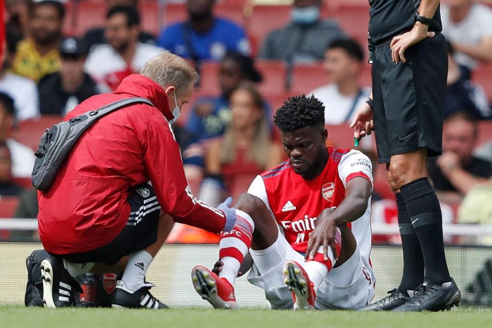 Arsenal midfielder Thomas Partey was injured against Chelsea in pre-season  (AFP via Getty Images)