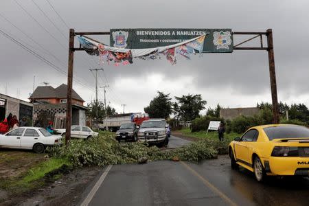 Residents block the access to their community to avoid the installation of polling stations for Mexico's general election in the indigenous Purepecha town of Nahuatzen, in Michoacan state, Mexico June 28, 2018. Picture taken June 28, 2018. REUTERS/Alan Ortega