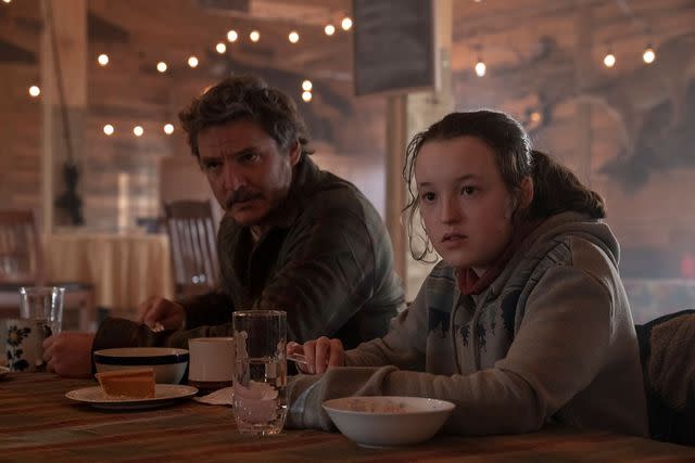 Liane Hentscher/HBO Pedro Pascal and Bella Ramsey in <em>The Last of Us</em>