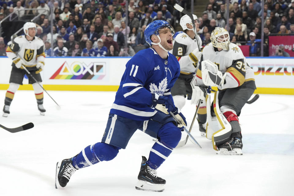 Toronto Maple Leafs' Max Domi (11) reacts after shooting wide of Vegas Golden Knights goaltender Adin Hill's net during the second period of an NHL hockey game in Toronto, on Tuesday, Feb. 27, 2024. (Chris Young/The Canadian Press via AP)