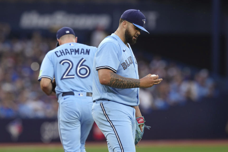 Toronto Blue Jays starting pitcher Alek Manoah pauses during the fourth inning of the team's baseball game against the San Diego Padres on Tuesday, July 18, 2023, in Toronto. (Chris Young/The Canadian Press via AP)