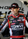 DAYTONA BEACH, FL - JANUARY 14: Jeff Gordon, driver of the #24 Drive To End Hunger Chevrolet, stands in the garage area during Daytona Preseason Thunder at Daytona International Speedway on January 14, 2012 in Daytona Beach, Florida. (Photo by Jerry Markland/Getty Images for NASCAR)