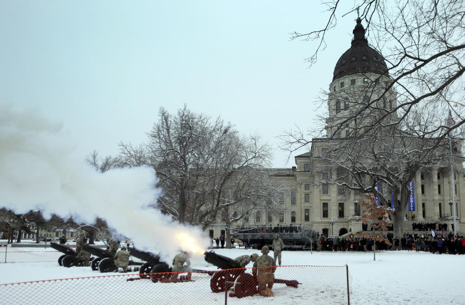 A 19-gun salute is fired as part of the inaugural ceremony for Gov. Laura Kelly on the south lawn of the Statehouse in Topeka, Kan., Monday, Jan. 14, 2019. (AP Photo/Orlin Wagner)