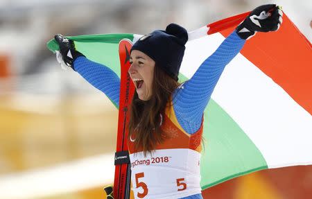 Alpine Skiing - Pyeongchang 2018 Winter Olympics - Women's Downhill - Jeongseon Alpine Centre - Pyeongchang, South Korea - February 21, 2018 - Sofia Goggia of Italy reacts during the victory ceremony. REUTERS/Kai Pfaffenbach