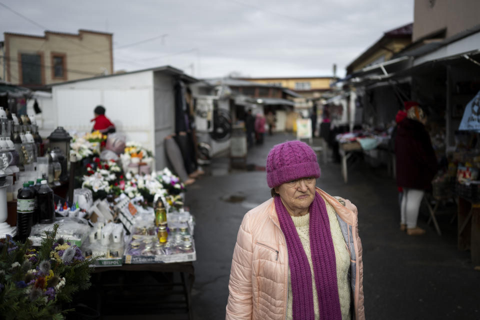 An ethnic Hungarian woman leaves the market in downtown Berehevo, Saturday, Jan. 27, 2024. Ukraine amended its laws to comply with EU membership requirements, and restored many of the language rights for minorities demanded by Budapest but Hungary's government has indicated it is not fully satisfied — a potentially explosive sticking point as EU leaders meet Thursday, Feb. 1, 2024 to try and break Orban's veto of a major aid package earmarked for Kyiv. (AP Photo/Denes Erdos)