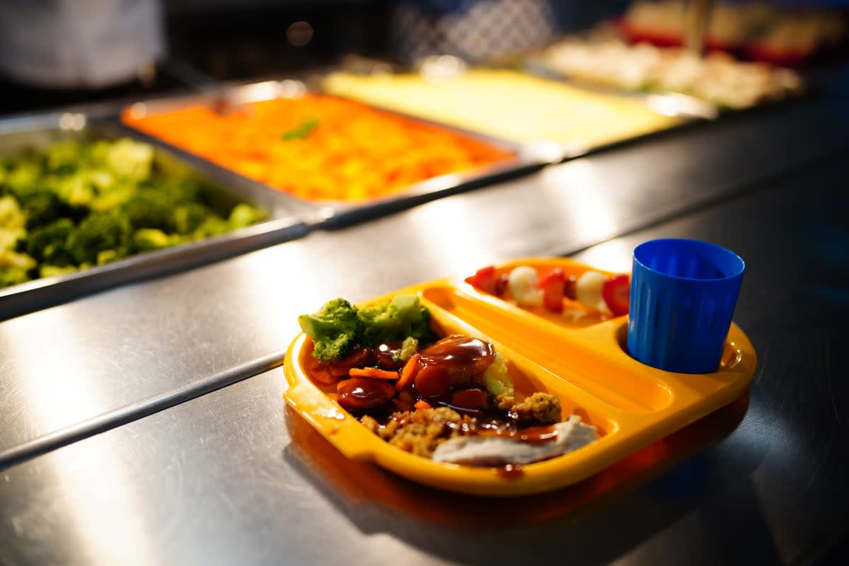 Nearly 2.1 million pupils in England are now eligible for free school meals  (Ben Birchall/PA Wire)