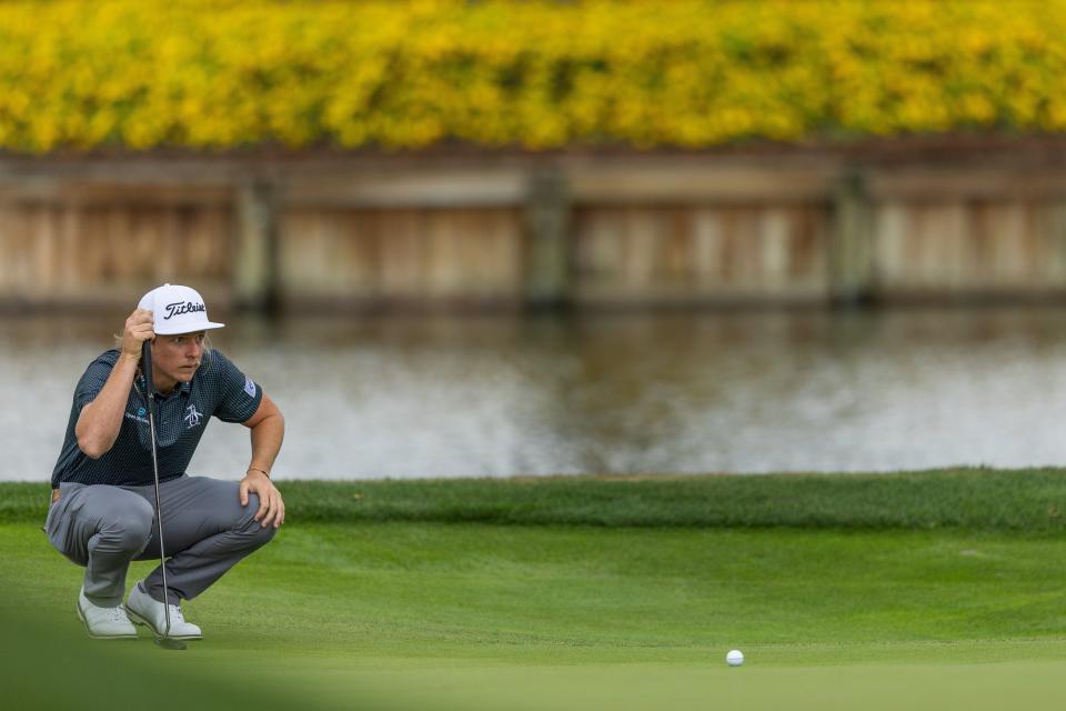 Cameron Smith studies a putt at the 16th hole of the Players Stadium Course during the 2022 Players Championship. He won the tournament by one shot.