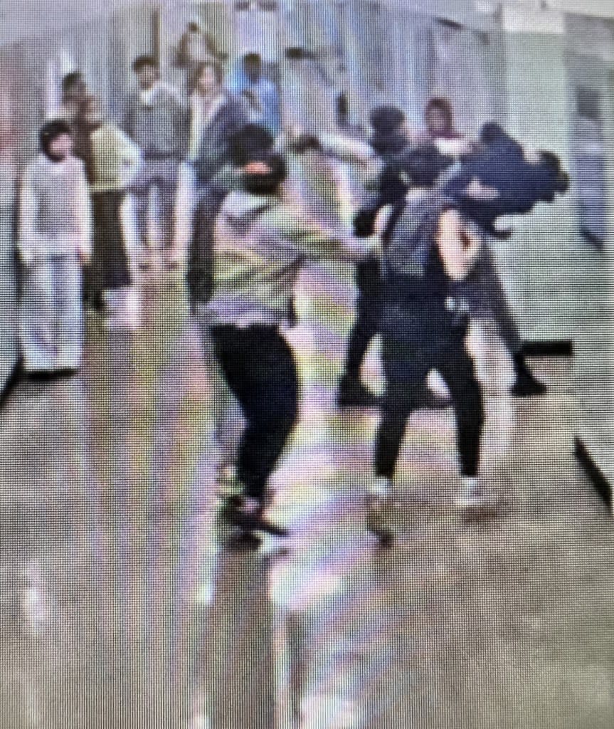 Fight in the halls of Origins HS.