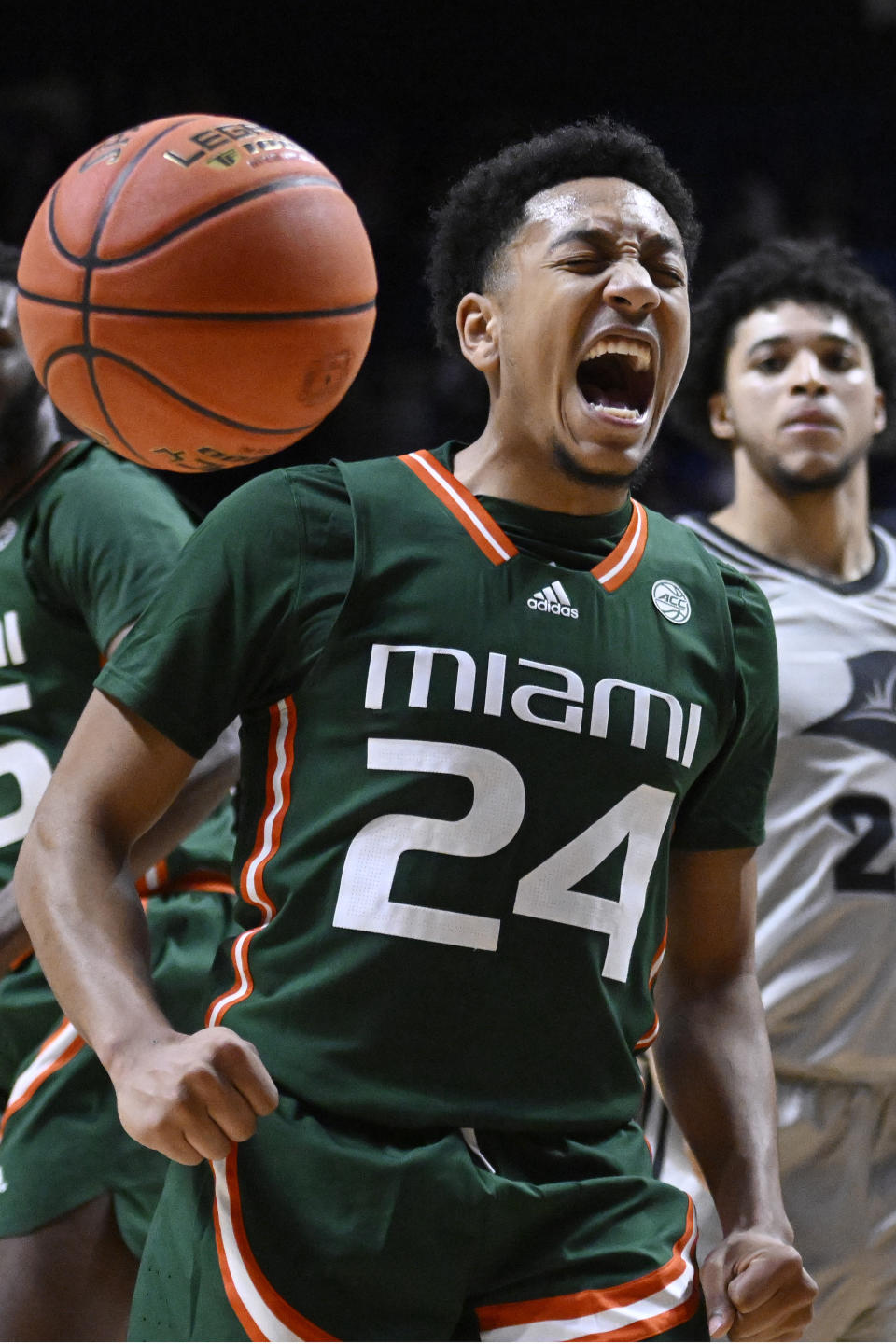 Miami guard Nijel Pack (24) reacts in the second half of an NCAA college basketball game against Providence, Saturday, Nov. 19, 2022, in Uncasville, Conn. (AP Photo/Jessica Hill)