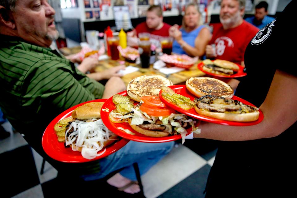 Customers are served lunch Aug. 4, 2021, inside Sid's Diner in El Reno, Oklahoma.