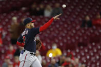 Washington Nationals' Luis Garcia throws out Cincinnati Reds' Jose Barrero at first base during the ninth inning of a baseball game Thursday, Sept. 23, 2021, in Cincinnati. (AP Photo/Jay LaPrete)