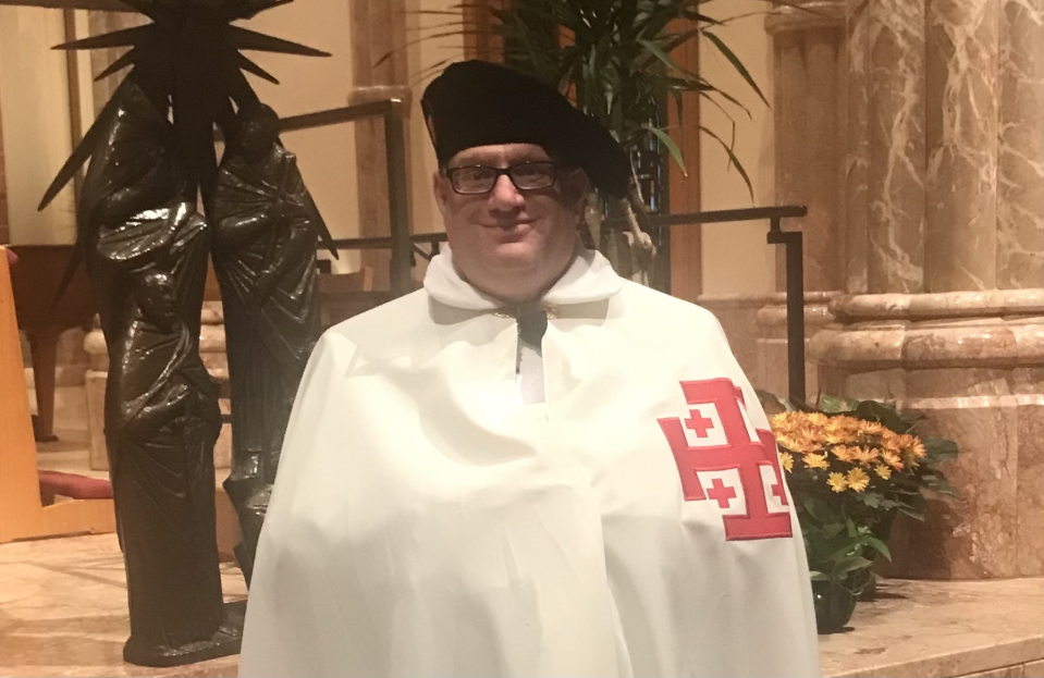 Paul A. Crowley of Waynesburg is shown in wearing his Knights of the Holy Sepulcher vestments during a visit to Jerusalem.