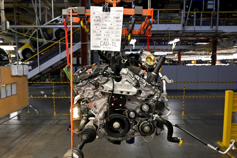 FILE PHOTO: An engine heads to the section of the plant where the drive train is added on the assembly line at the General Motors (GM) manufacturing plant in Spring Hill, Tennessee