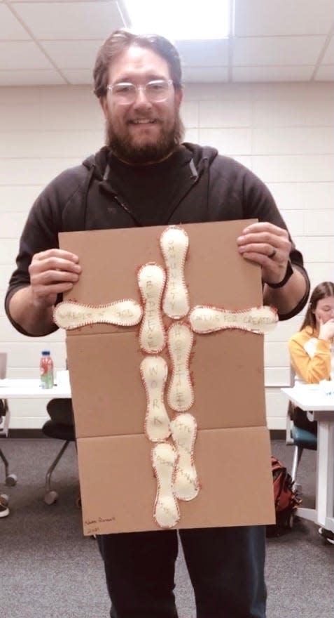 Students at Mount Marty-Watertown are encouraged to express themselves creatively. This past year, Nathan Russell chose to use baseball leathers to create of a cross.