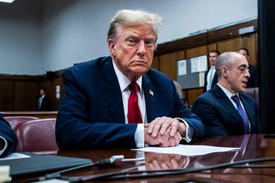 <p> Jabin Botsford-Pool/Getty</p> Former President Donald Trump sits in a Manhattan courtroom on day one of his criminal trial