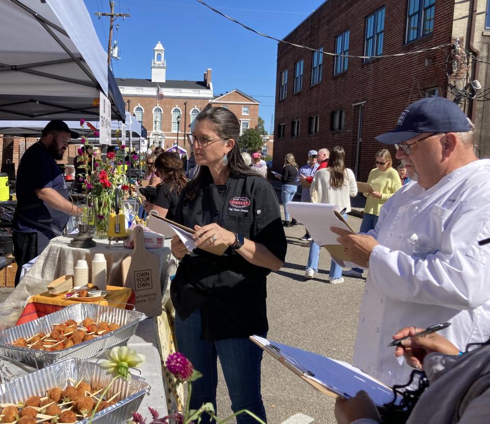 Christi Ferretti of Pine Valley Market and Bill Scott of Cape Fear Seafood Company are among the local judges for the Own Your Own Competition where contestants can win their own restaurant in Burgaw, N.C. The Town Square Cook-off took place Oct. 21, 2023.