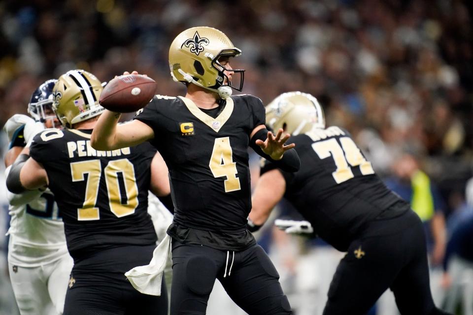New Orleans Saints quarterback Derek Carr throws the ball in the fourth quarter against the Tennessee Titans.