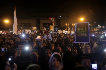 People gather for a protest against the killing of social activists, at the Plaza de Bolivar in Bogota