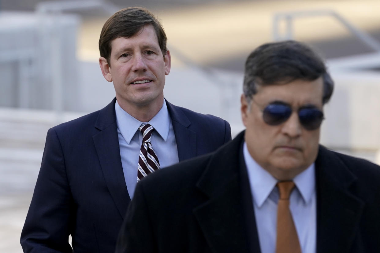Former Republican state Sen. Brian Kelsey, left, arrives at federal court Tuesday, Nov. 22, 2022, in Nashville, Tenn. Kelsey changed an earlier plea of not guilty to guilty Tuesday, on charges of violating federal campaign finance laws. (AP Photo/Mark Humphrey)