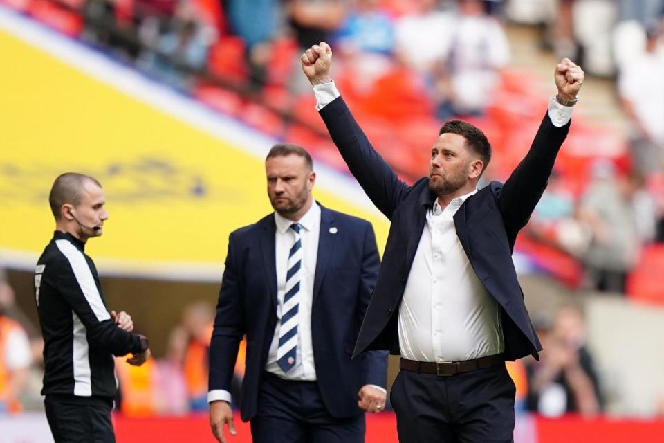 Ian Evatt and Des Buckingham after the final whistle at Wembley <i>(Image: PA)</i>