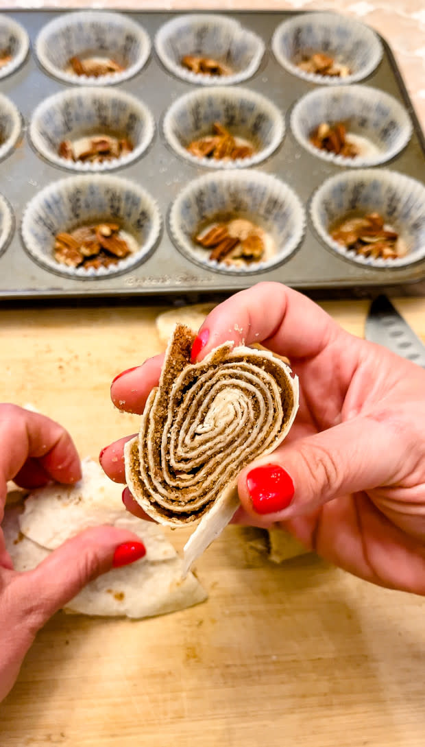 Cutting tortilla cinnamon rolls in pinwheels<p>Courtesy of Jessica Wrubel</p>