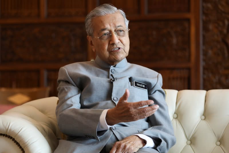 Malaysia's Prime Minister Mahathir Mohamad speaks during an interview with Reuters in Putrajaya